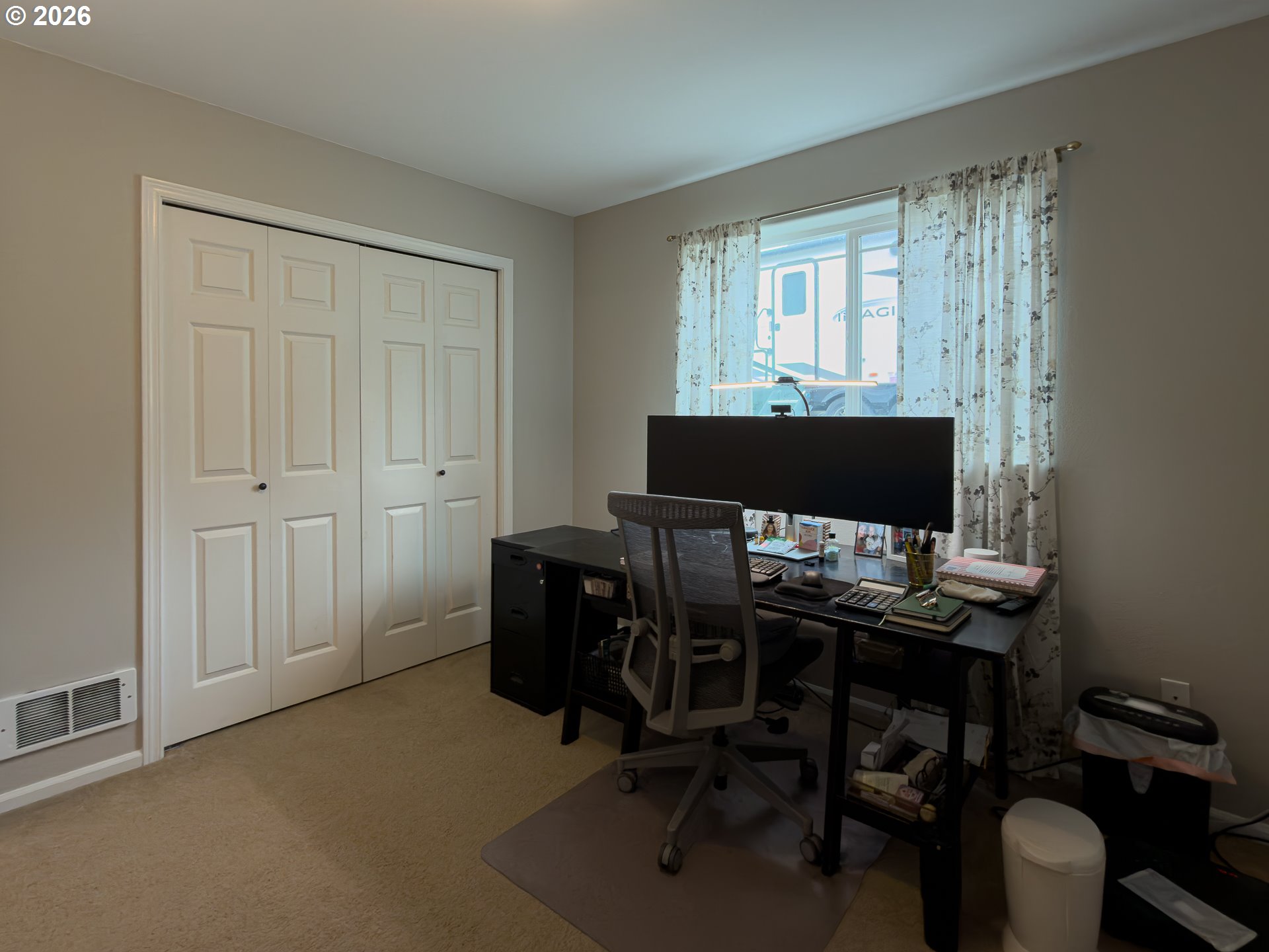 1185 11th Street Southeast Bandon, OR 97411 - Photo 36 of 48 a workspace with furniture and window