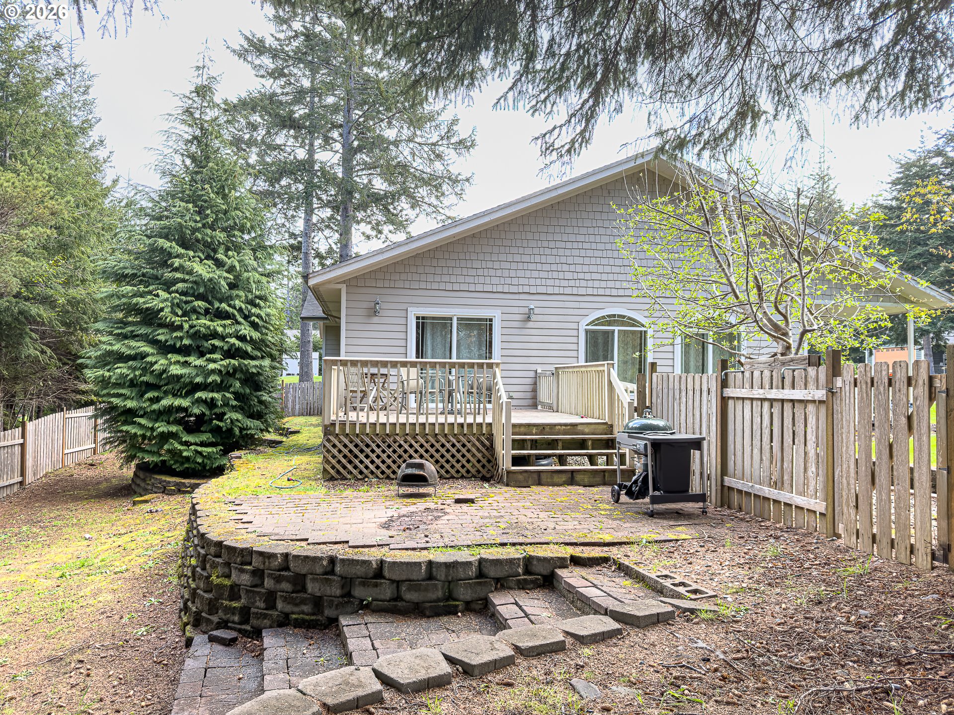1185 11th Street Southeast Bandon, OR 97411 - Photo 39 of 48 a house view with a outdoor seating