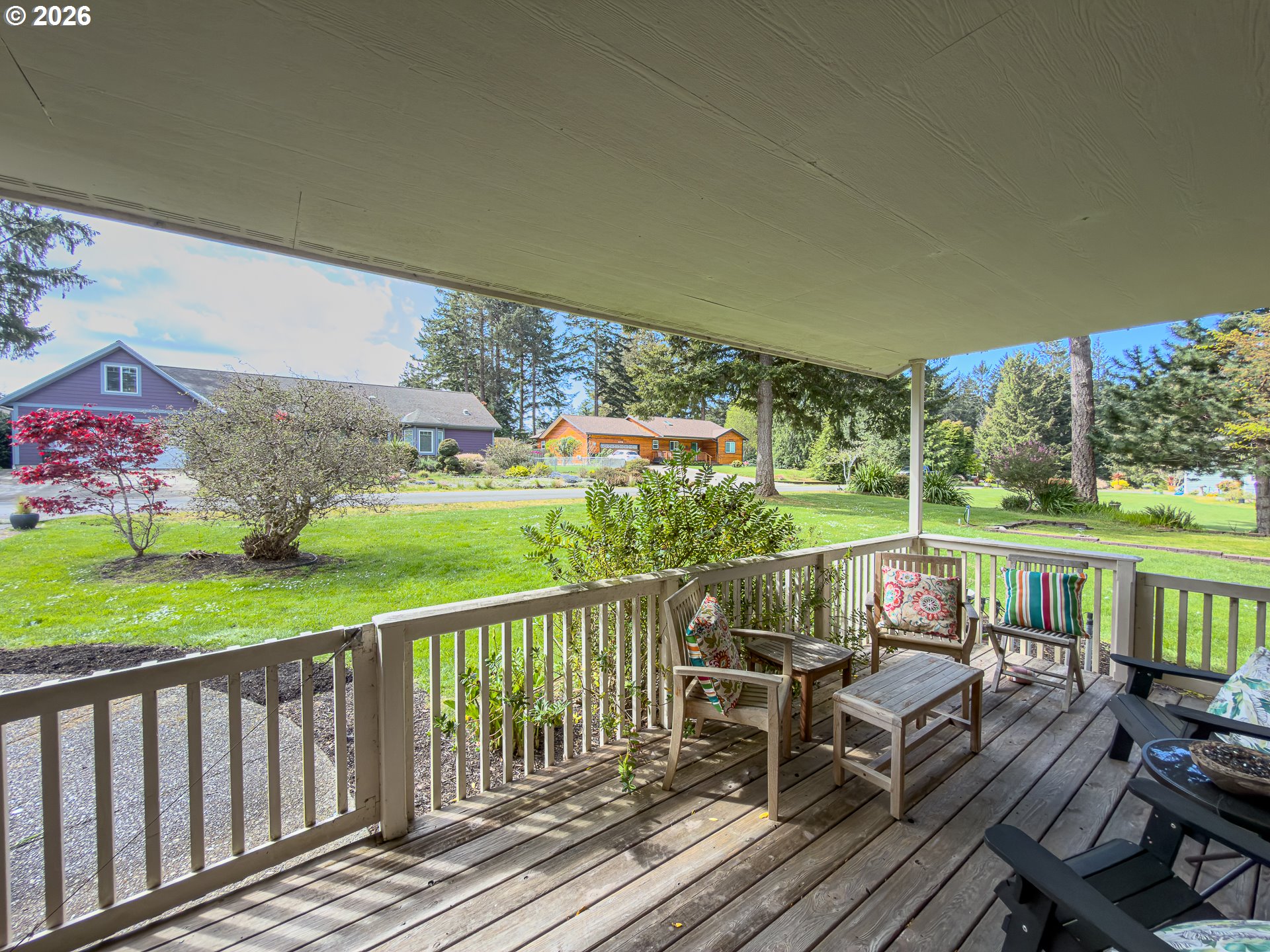 1185 11th Street Southeast Bandon, OR 97411 - Photo 6 of 48 a view of roof deck with furniture