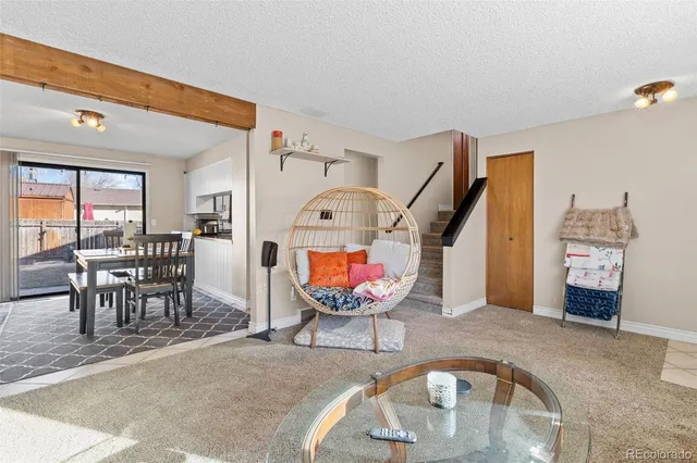 a view of a livingroom with furniture and a livingroom