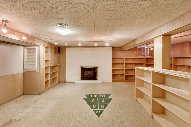 36 South Cowley Road Riverside, IL 60546 - Photo 30 of 42 a view of a room with shelves