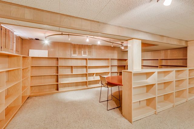 36 South Cowley Road Riverside, IL 60546 - Photo 31 of 42 a view of an empty room with empty shelves
