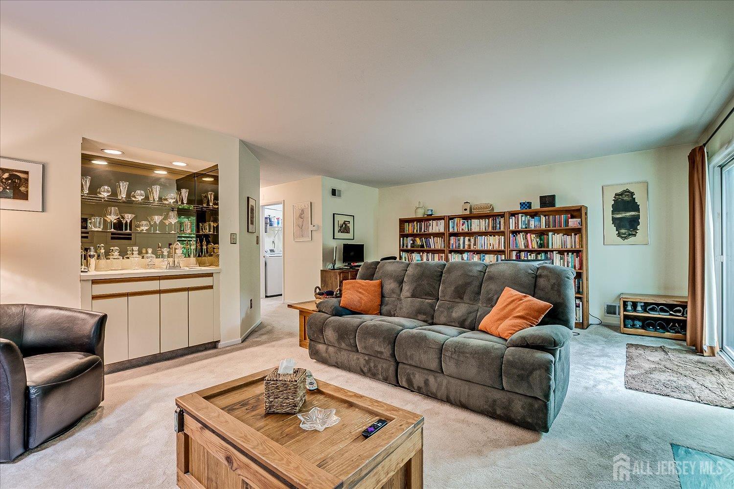 4805 Stonehedge Road Edison, NJ 08820 - Photo 36 of 41 a living room with furniture and a window
