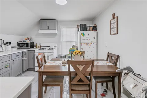 a room with furniture and a flat screen tv