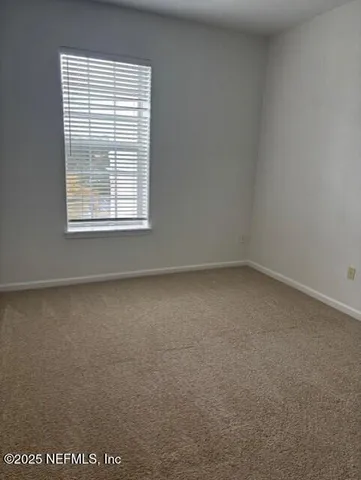 a view of a kitchen with a sink