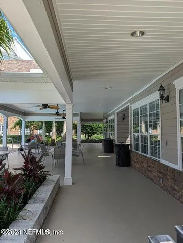 a view of a porch with a backyard