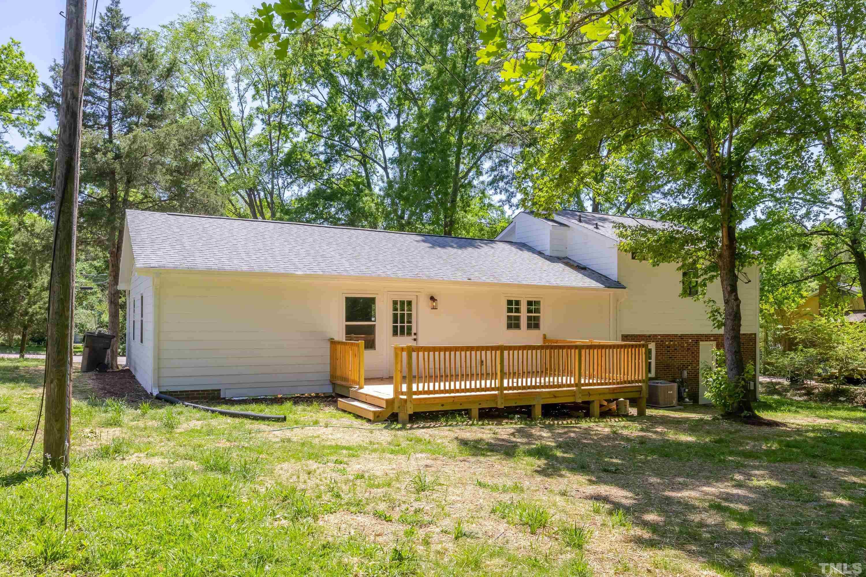1321 Sedwick Road Durham, NC 27713 - Photo 25 of 27 front view of a house with a yard