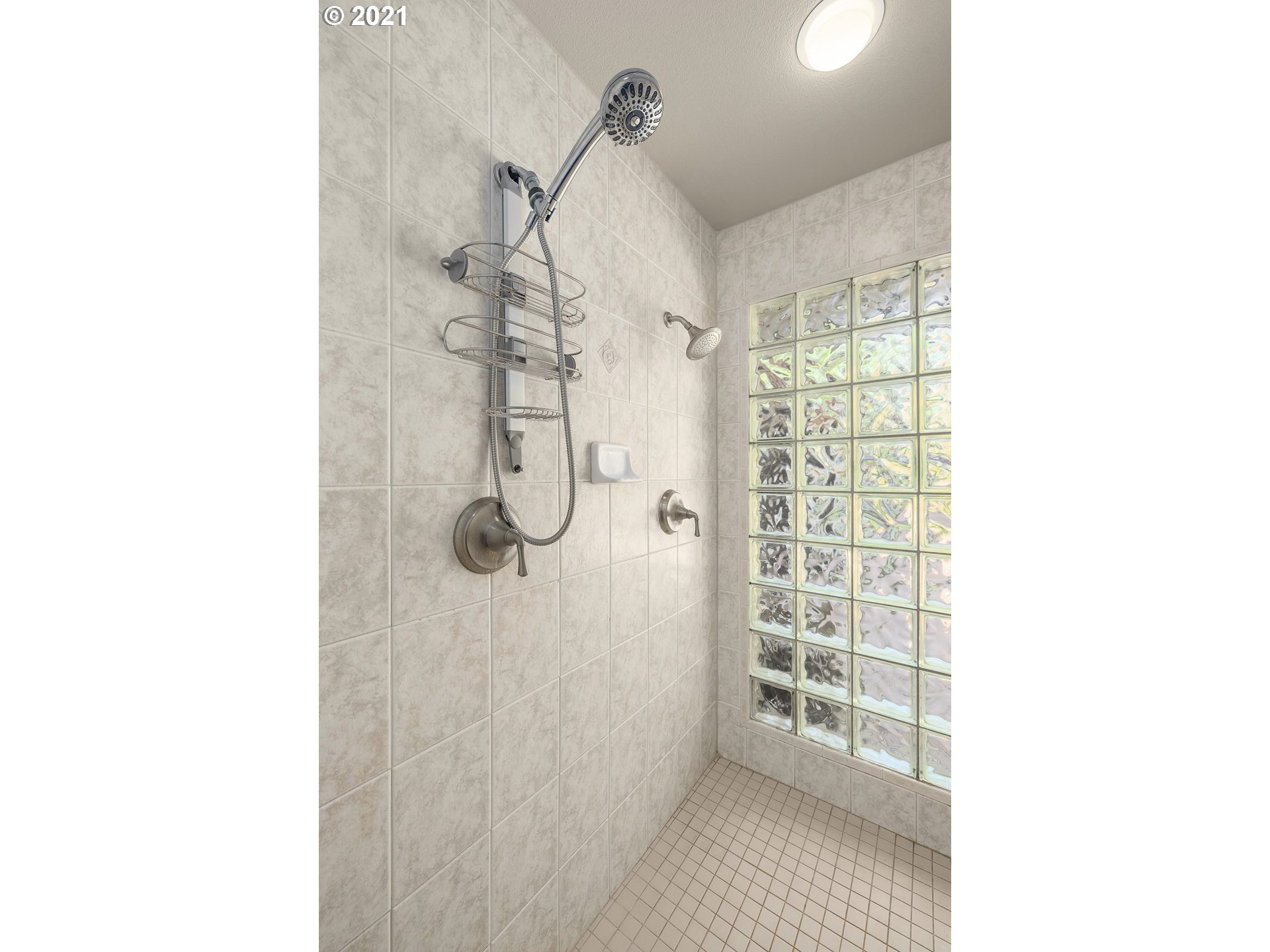 3916 Southwest Shattuck Road Portland, OR 97221 - Photo 17 of 28 a bathroom with a shower