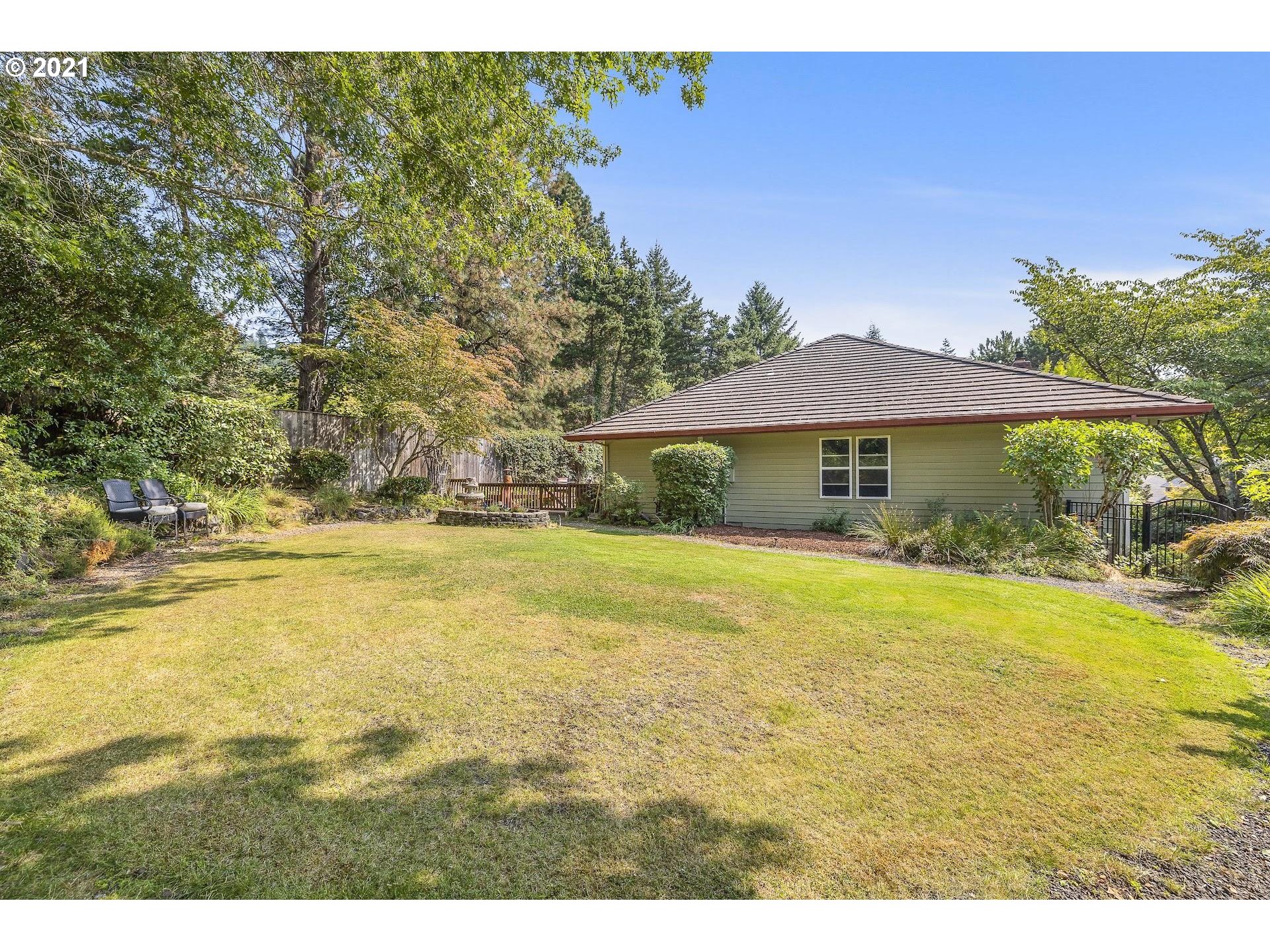 3916 Southwest Shattuck Road Portland, OR 97221 - Photo 24 of 28 a view of an house with pool and outdoor space