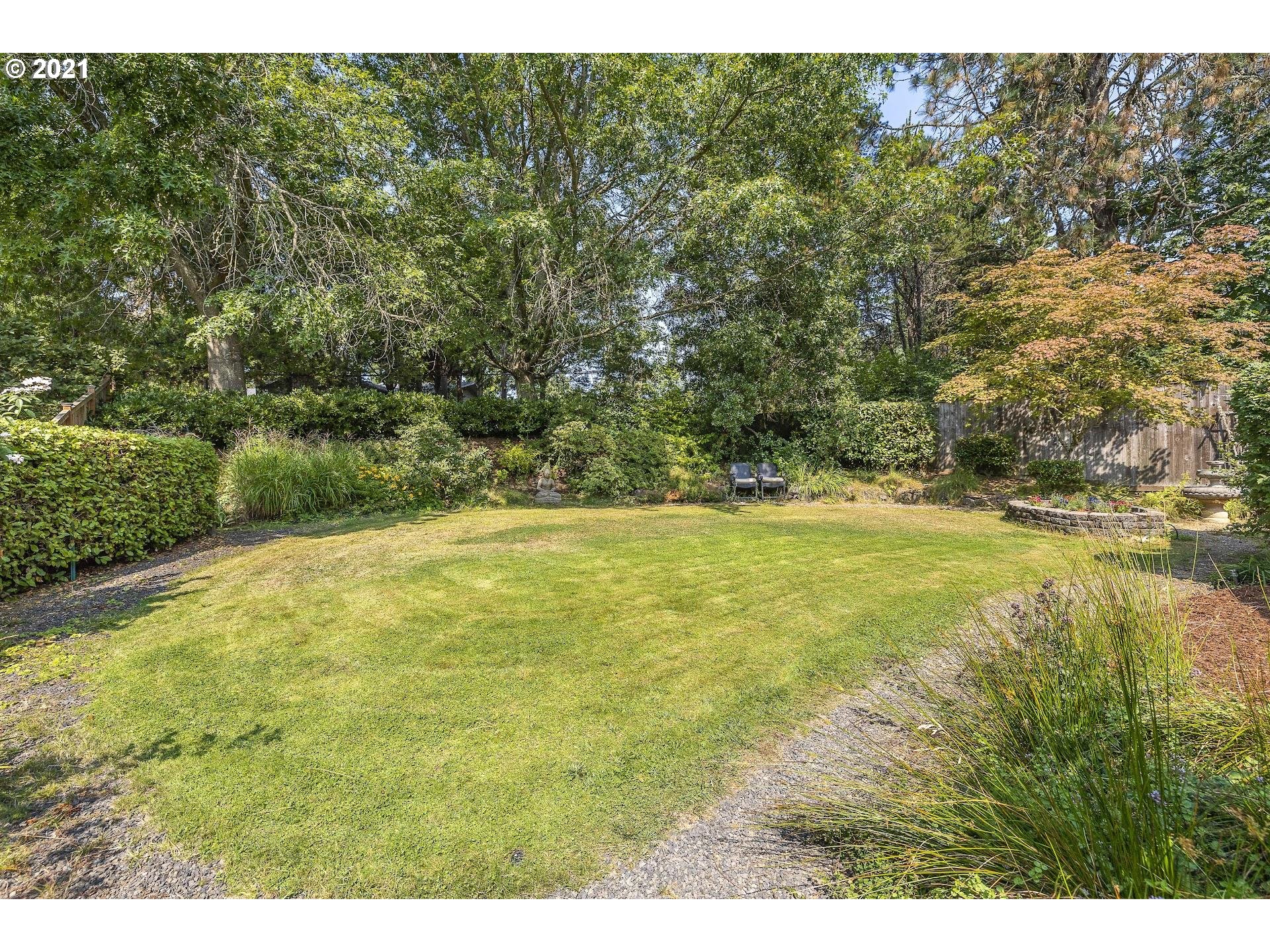 3916 Southwest Shattuck Road Portland, OR 97221 - Photo 25 of 28 a view of a yard with an outdoor space