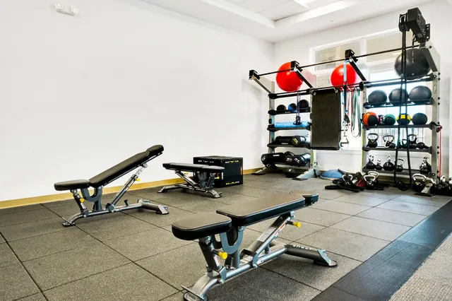 a view of a room with gym equipment