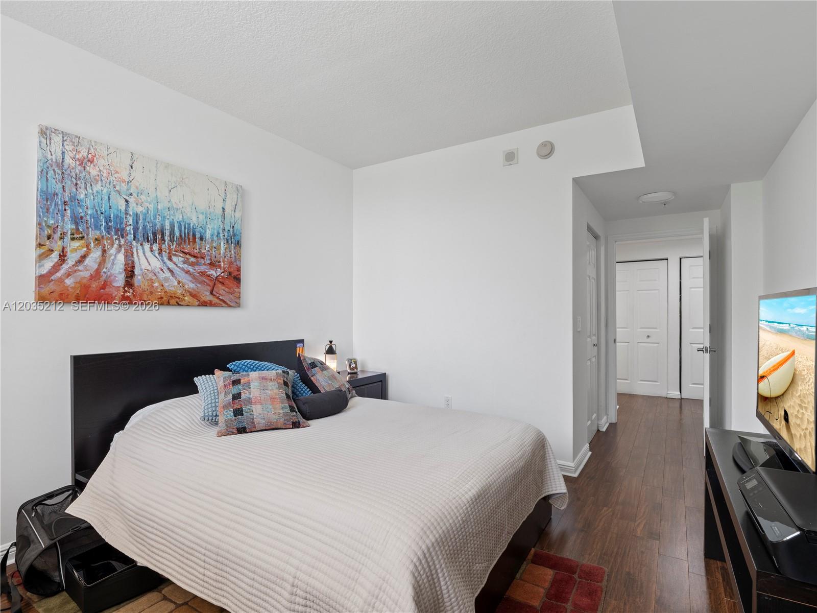 888 Douglas Road, Unit 302 Coral Gables, FL 33134 - Photo 26 of 51 SECOND BEDROOM WITH CUSTOM BUILT WALK-IN CLOSET