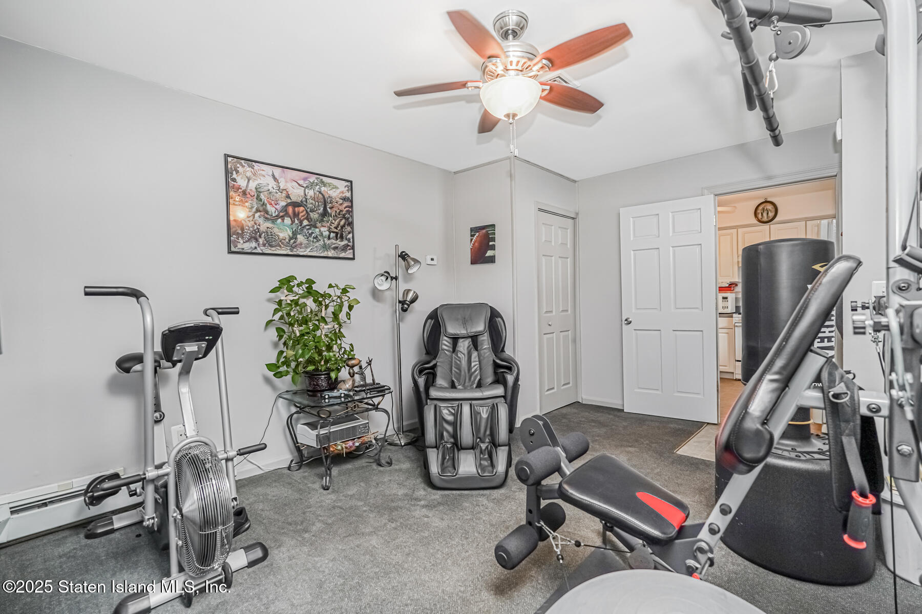 149 Rensselaer Avenue Staten Island, NY 10312 - Photo 12 of 33 a living room with furniture a air conditioner and a window