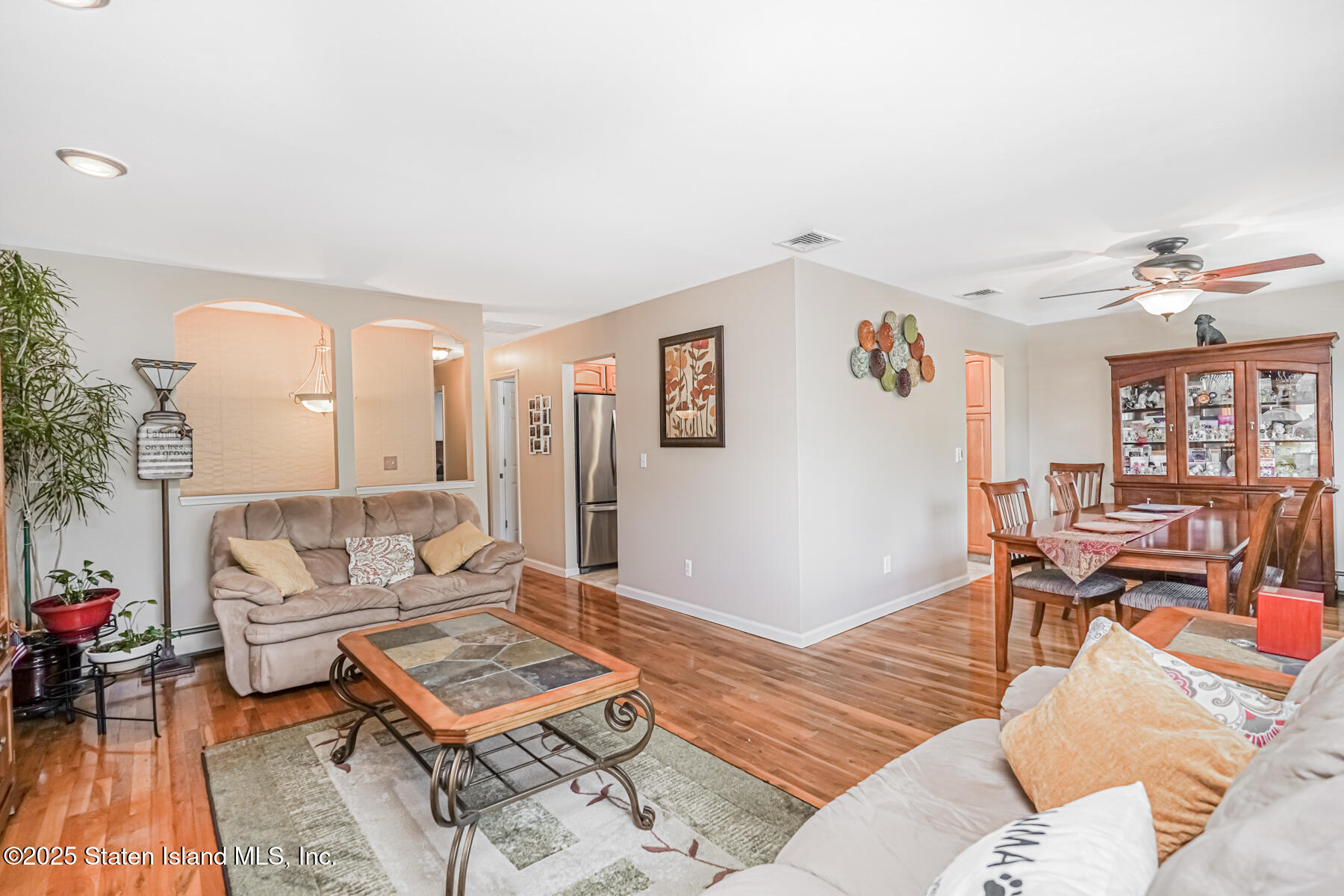149 Rensselaer Avenue Staten Island, NY 10312 - Photo 18 of 33 a living room with furniture and wooden floor