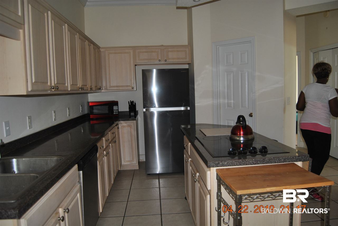 411 Juniper Creek Road Brewton, AL 36426 - Photo 22 of 35 Kitchen is made for a cook lots of cabinets, islan