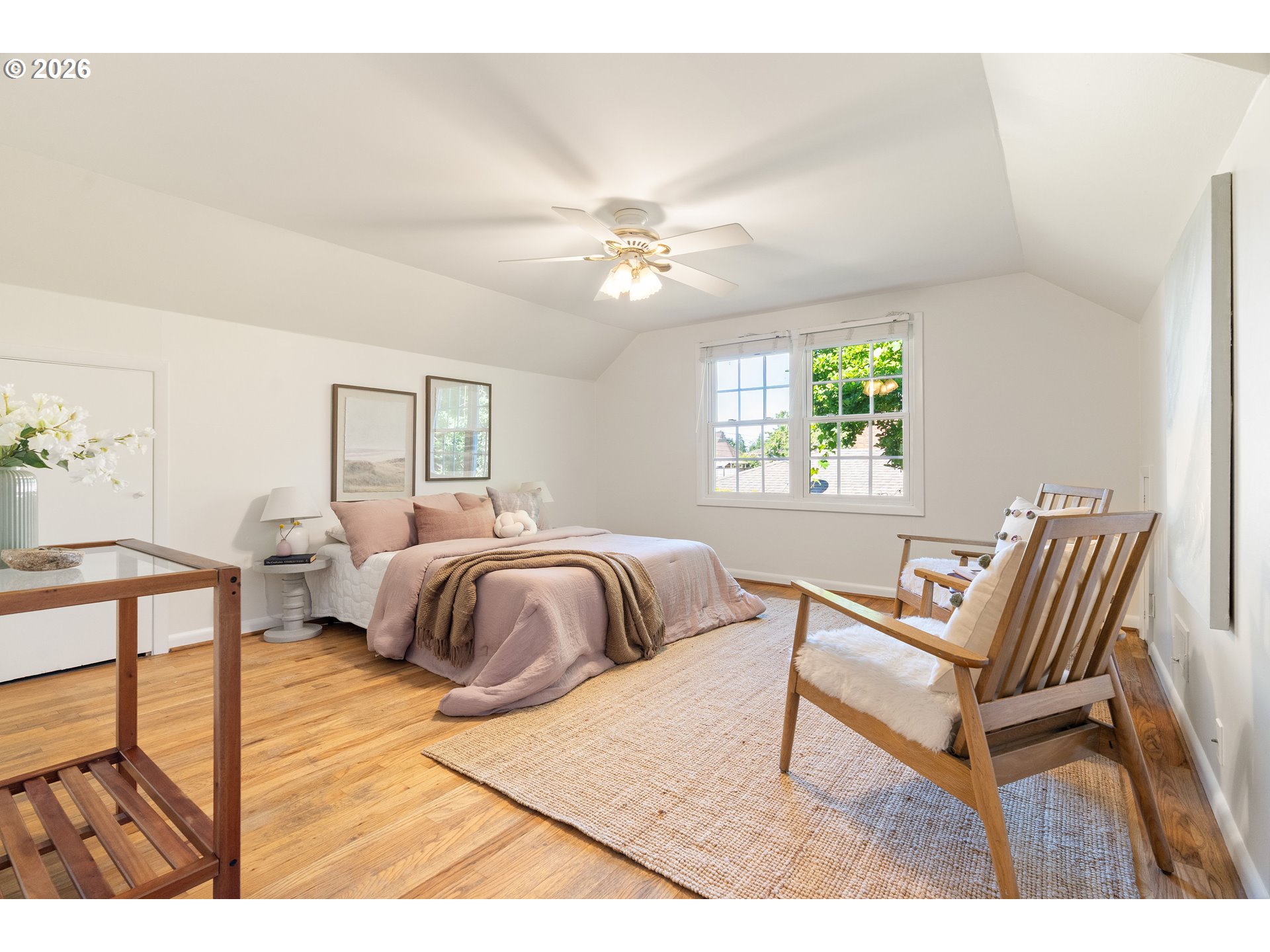 7541 Northeast Alameda Street Portland, OR 97213 - Photo 21 of 35 a spacious bedroom with a bed and a window