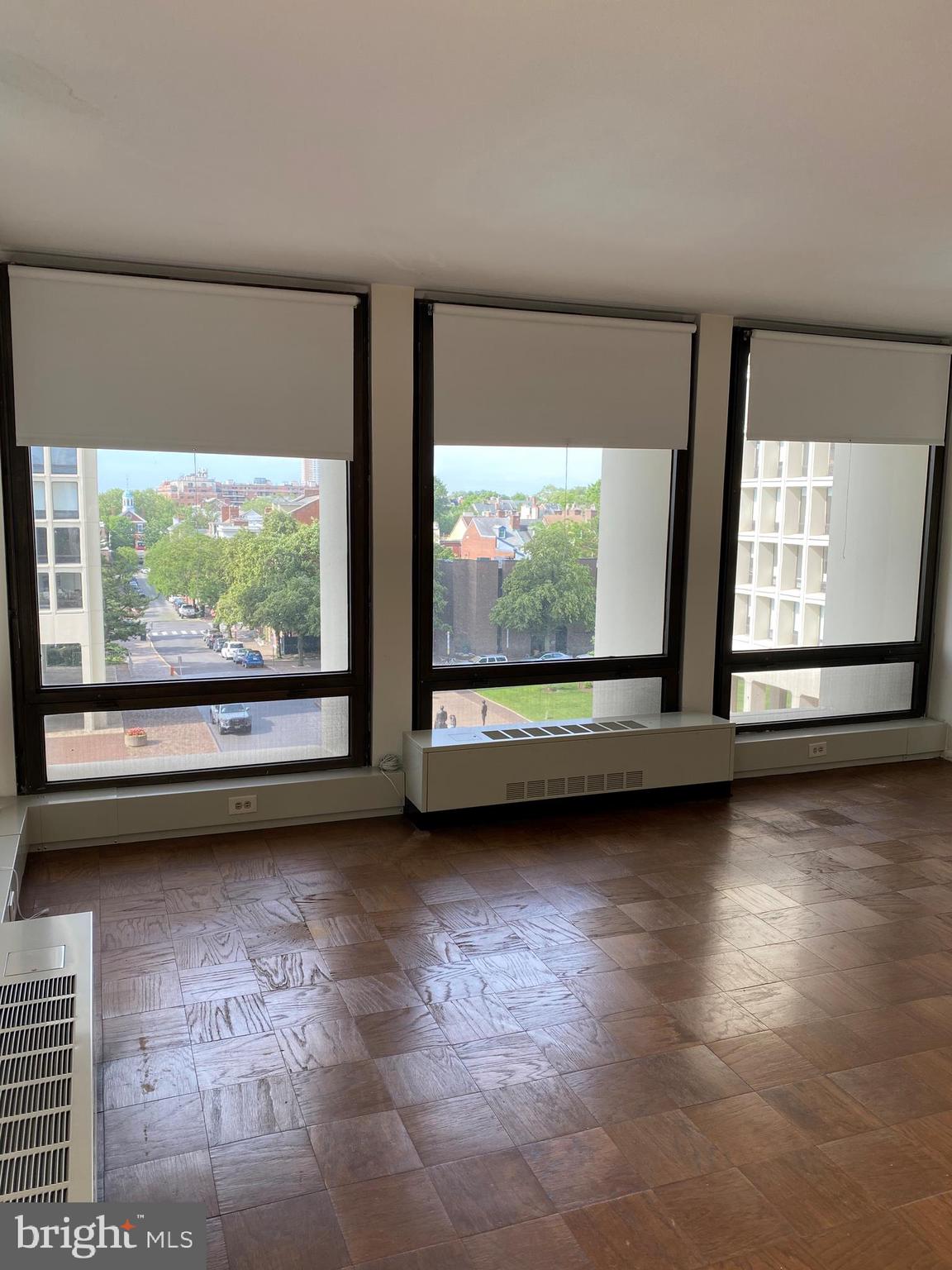 a view of room with window and outdoor space