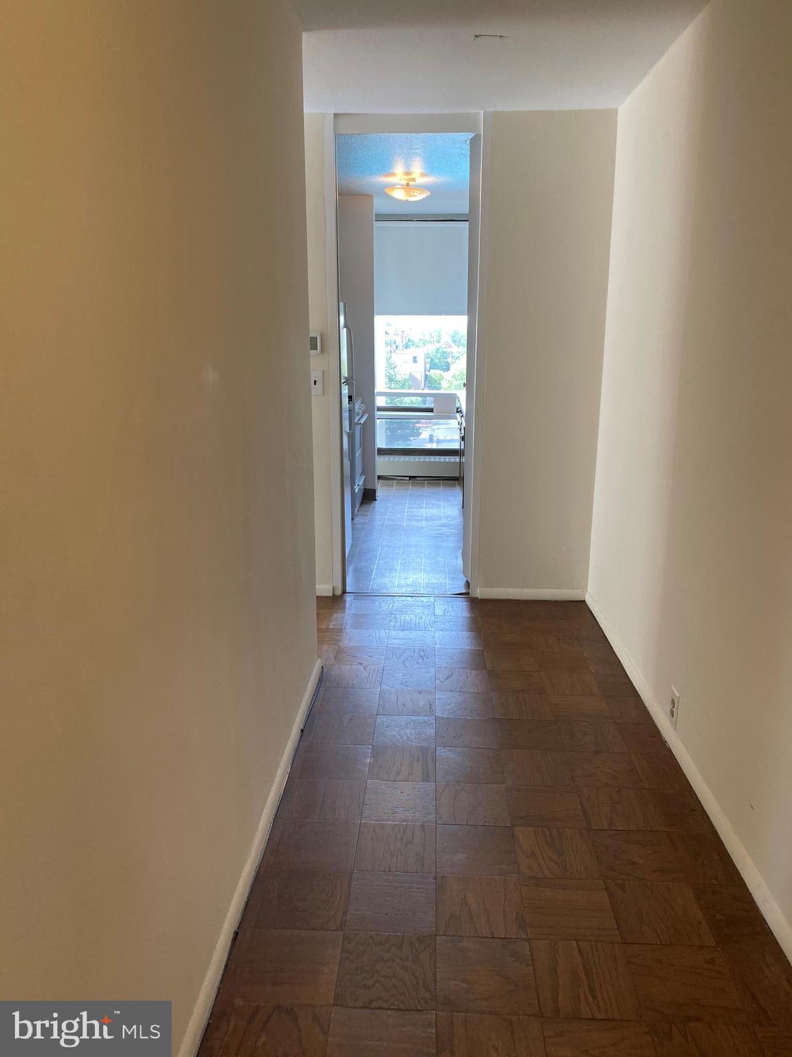 200 Locust Street, Unit 4GN Philadelphia, PA 19106 - Photo 8 of 13 a view of a hallway with wooden floor