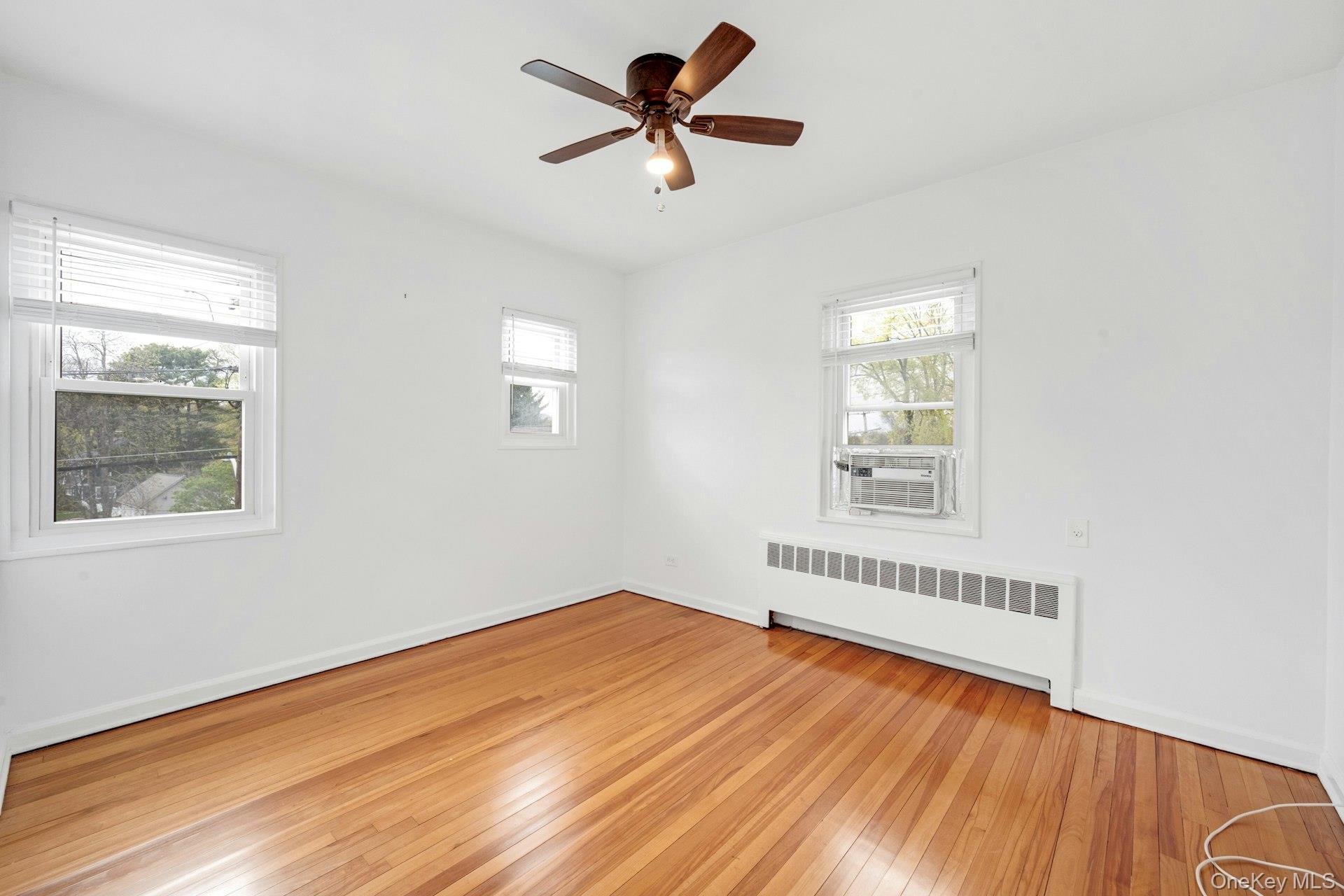 184 Purchase Street, Unit 12 Rye, NY 10580 - Photo 21 of 33 a view of an empty room with a window
