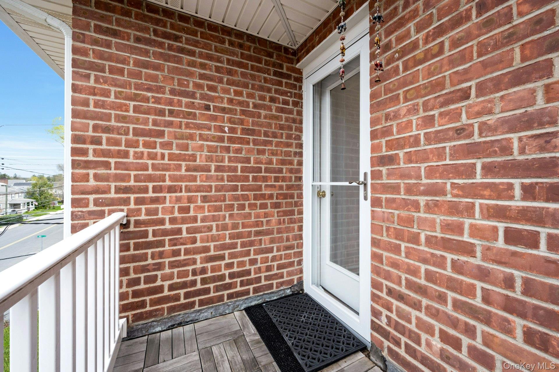 184 Purchase Street, Unit 12 Rye, NY 10580 - Photo 27 of 33 a view of a brick wall and a window