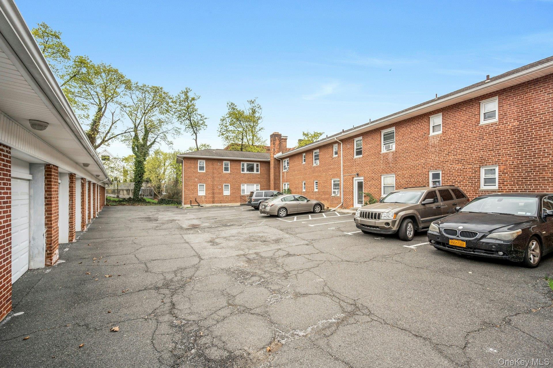 184 Purchase Street, Unit 12 Rye, NY 10580 - Photo 28 of 33 a view of a cars park in front of a building