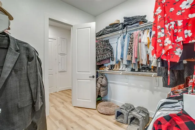 a bed room with a bed and a window