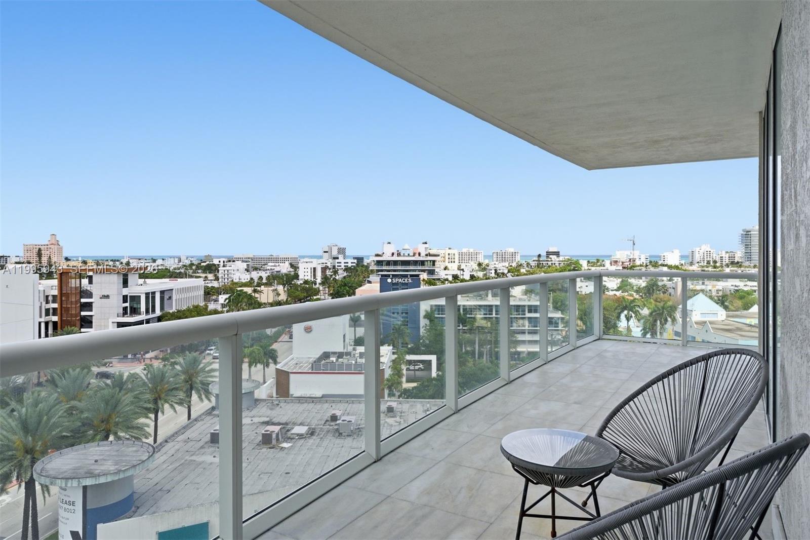 450 Alton Road, Unit 910 Miami Beach, FL 33139 - Photo 30 of 59 a city view from a balcony