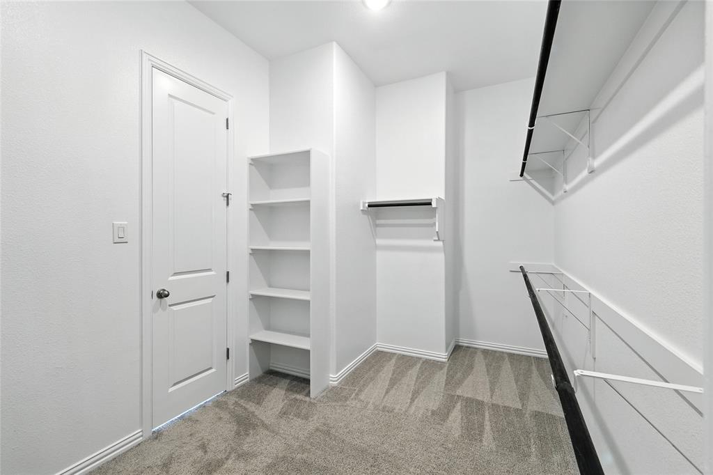 530 Red Barn Drive Van Alstyne, TX 75495 - Photo 20 of 40 Spacious closet with carpet floors