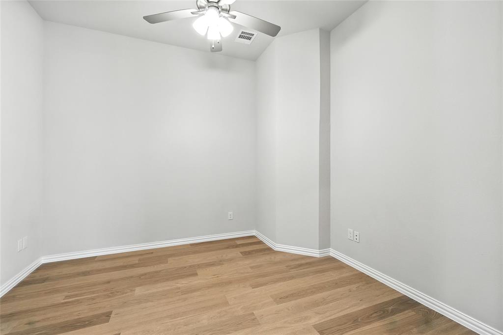 530 Red Barn Drive Van Alstyne, TX 75495 - Photo 22 of 40 Unfurnished room with light wood-style floors and ceiling fan