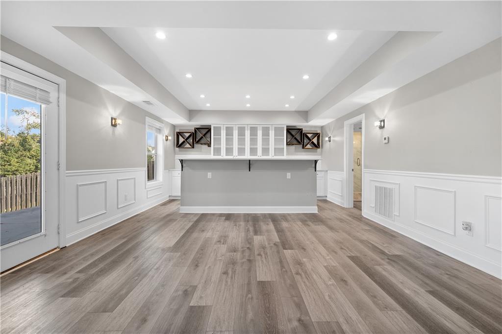 2375 Matlin Way Buford, GA 30519 - Photo 44 of 58 a view of wooden floor and windows in a room