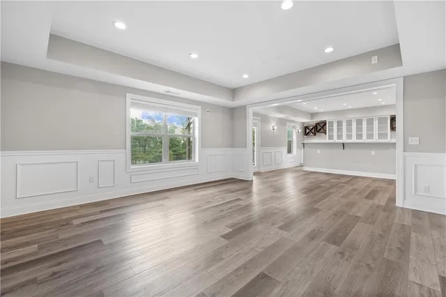 a view of a house with swimming pool in front of it