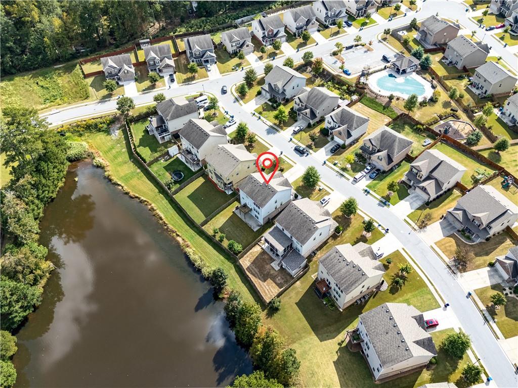 2375 Matlin Way Buford, GA 30519 - Photo 54 of 58 an aerial view of a house with a yard and lake view