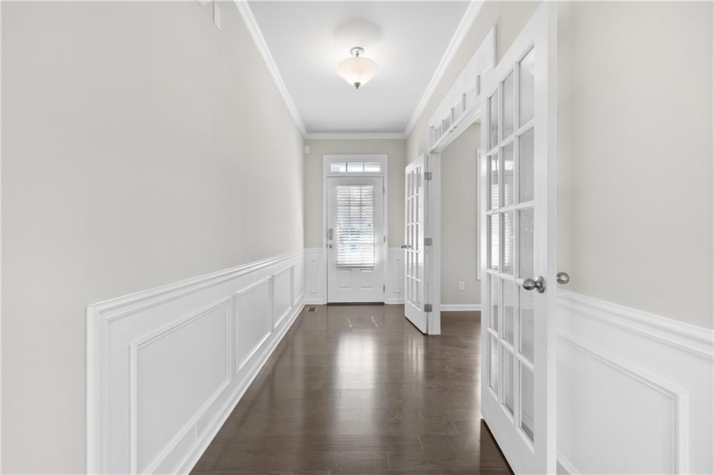 2375 Matlin Way Buford, GA 30519 - Photo 9 of 58 a view of an entryway with wooden floor