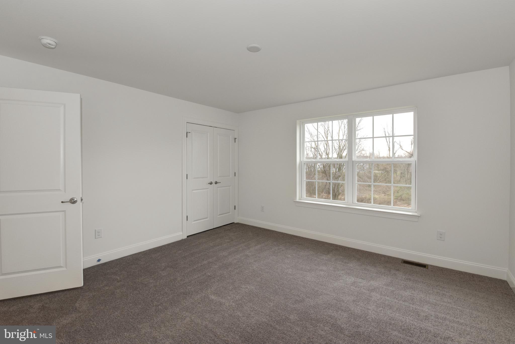 400 Rederick Lane, Unit 2 Middletown, DE 19709 - Photo 12 of 23 a view of an empty room with a window