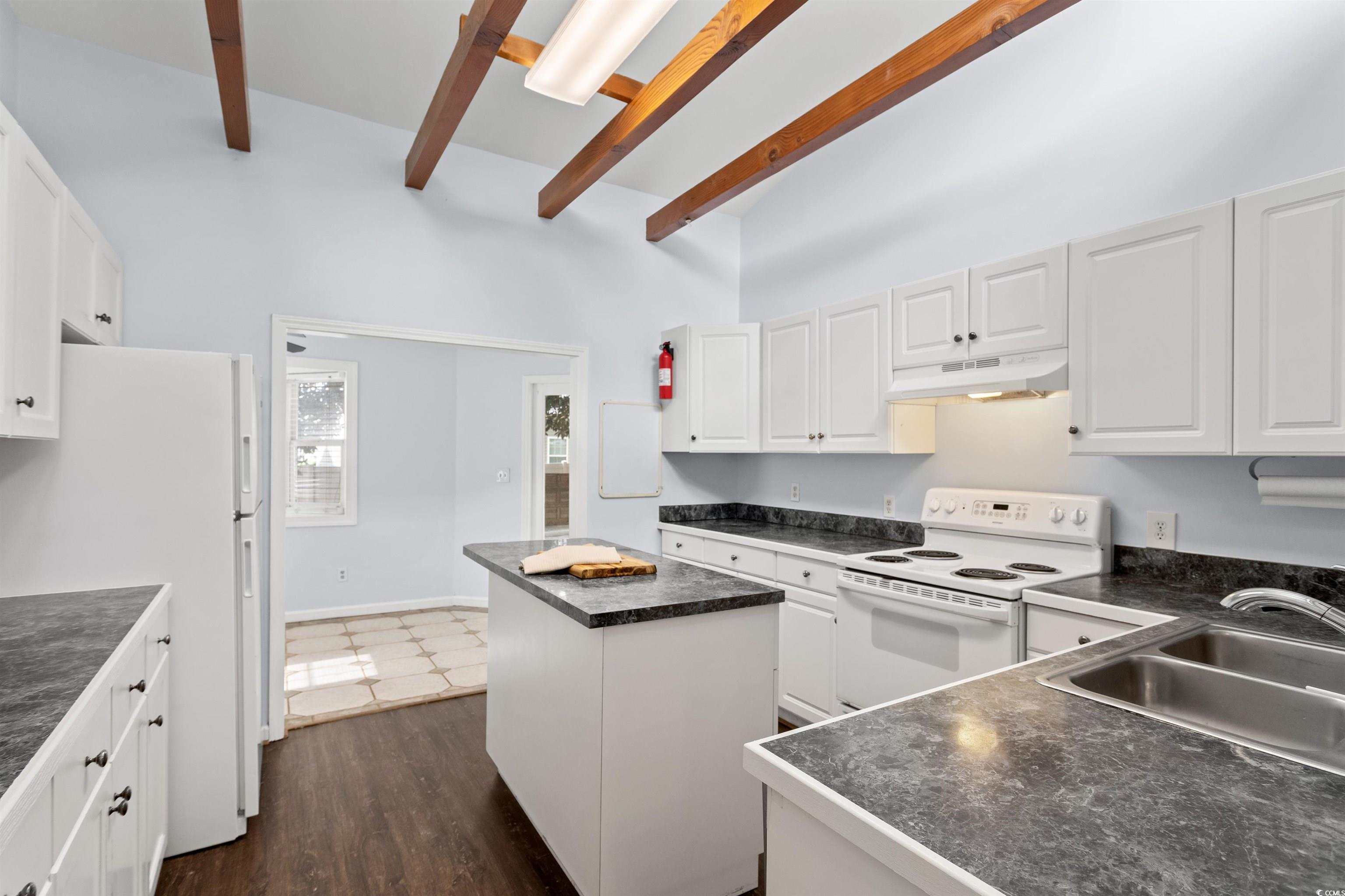 949 Derrick Lane Murrells Inlet, SC 29576 - Photo 11 of 40 Kitchen featuring beamed ceiling, white appliances