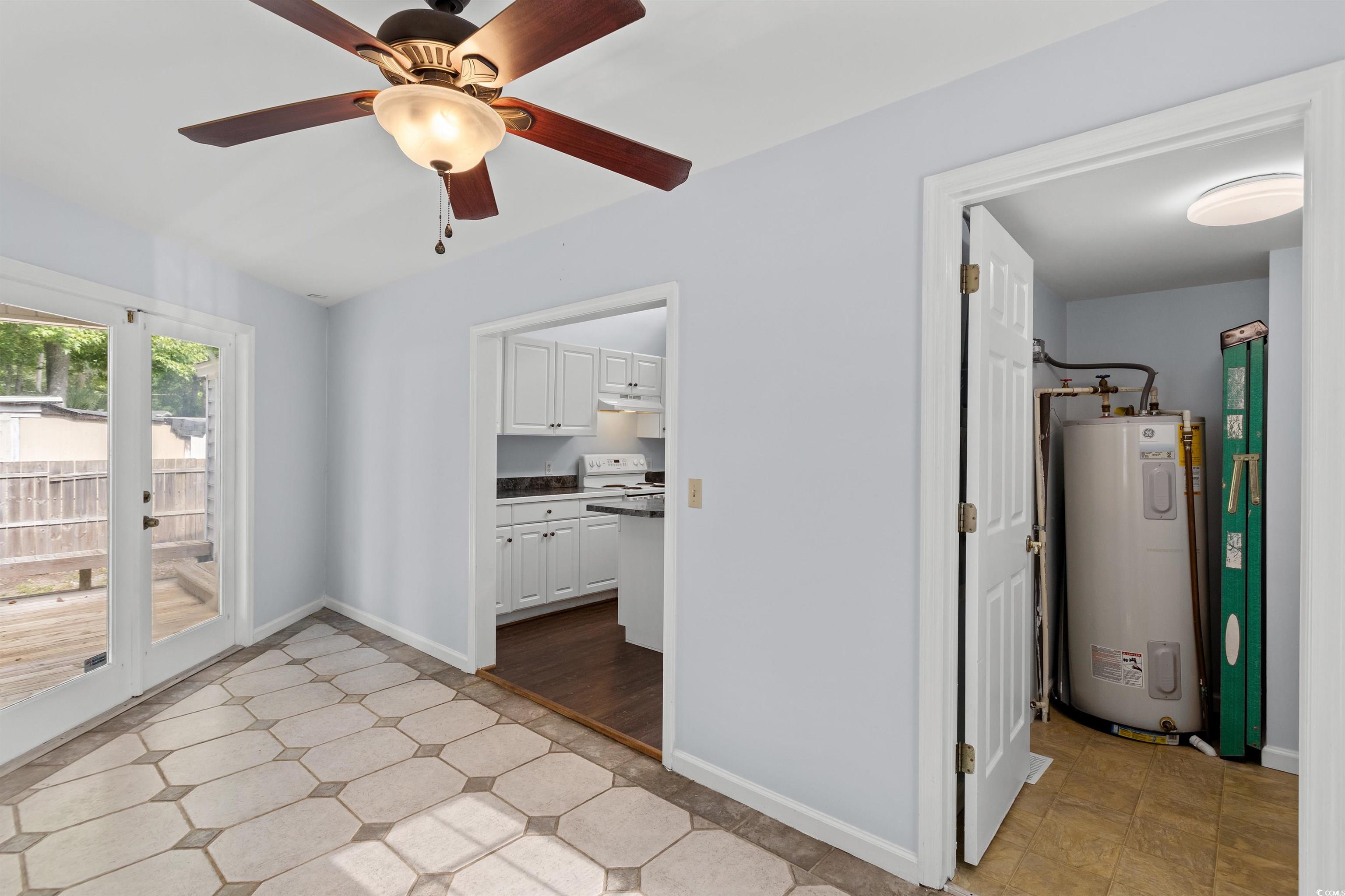 949 Derrick Lane Murrells Inlet, SC 29576 - Photo 16 of 40 Interior space featuring light tile patterned floo