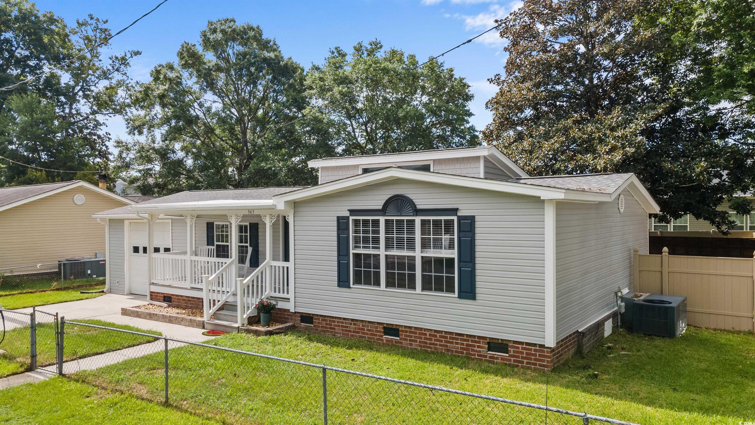 949 Derrick Lane Murrells Inlet, SC 29576 - Photo 2 of 40 View of front of house featuring central air condi