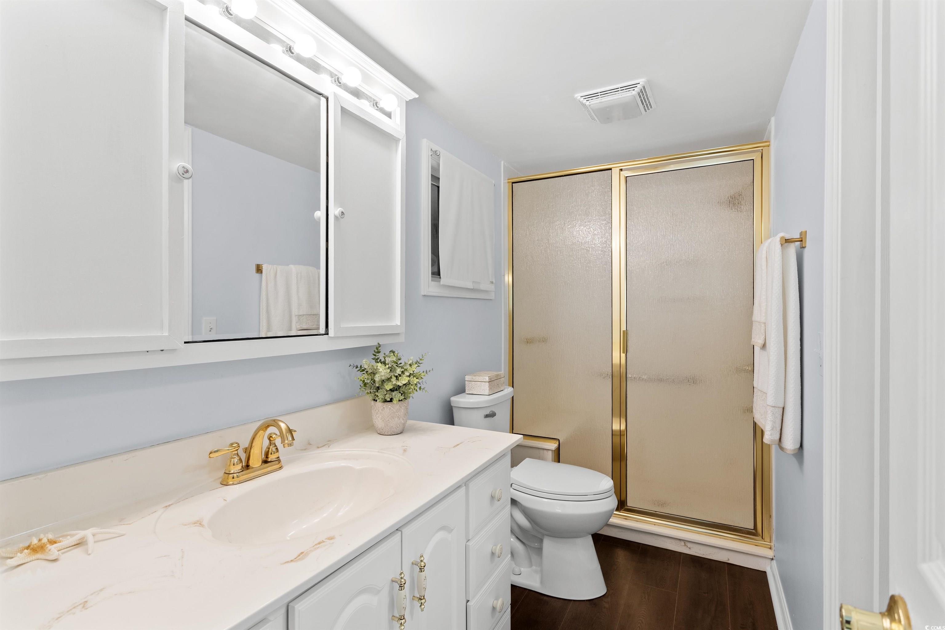 949 Derrick Lane Murrells Inlet, SC 29576 - Photo 23 of 40 Bathroom with toilet, a shower with shower door, h