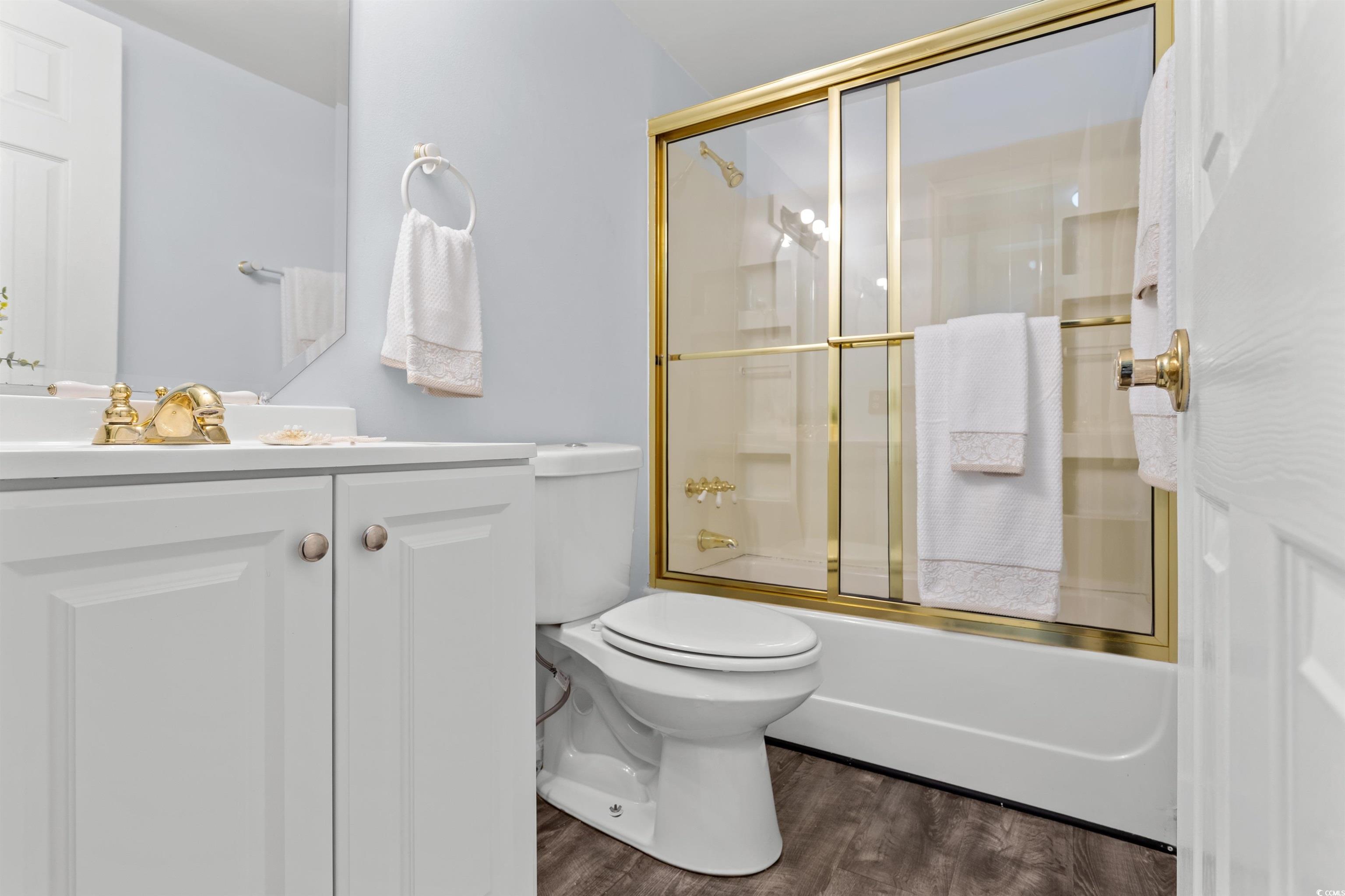 949 Derrick Lane Murrells Inlet, SC 29576 - Photo 30 of 40 Full bathroom with wood-type flooring, toilet, sho