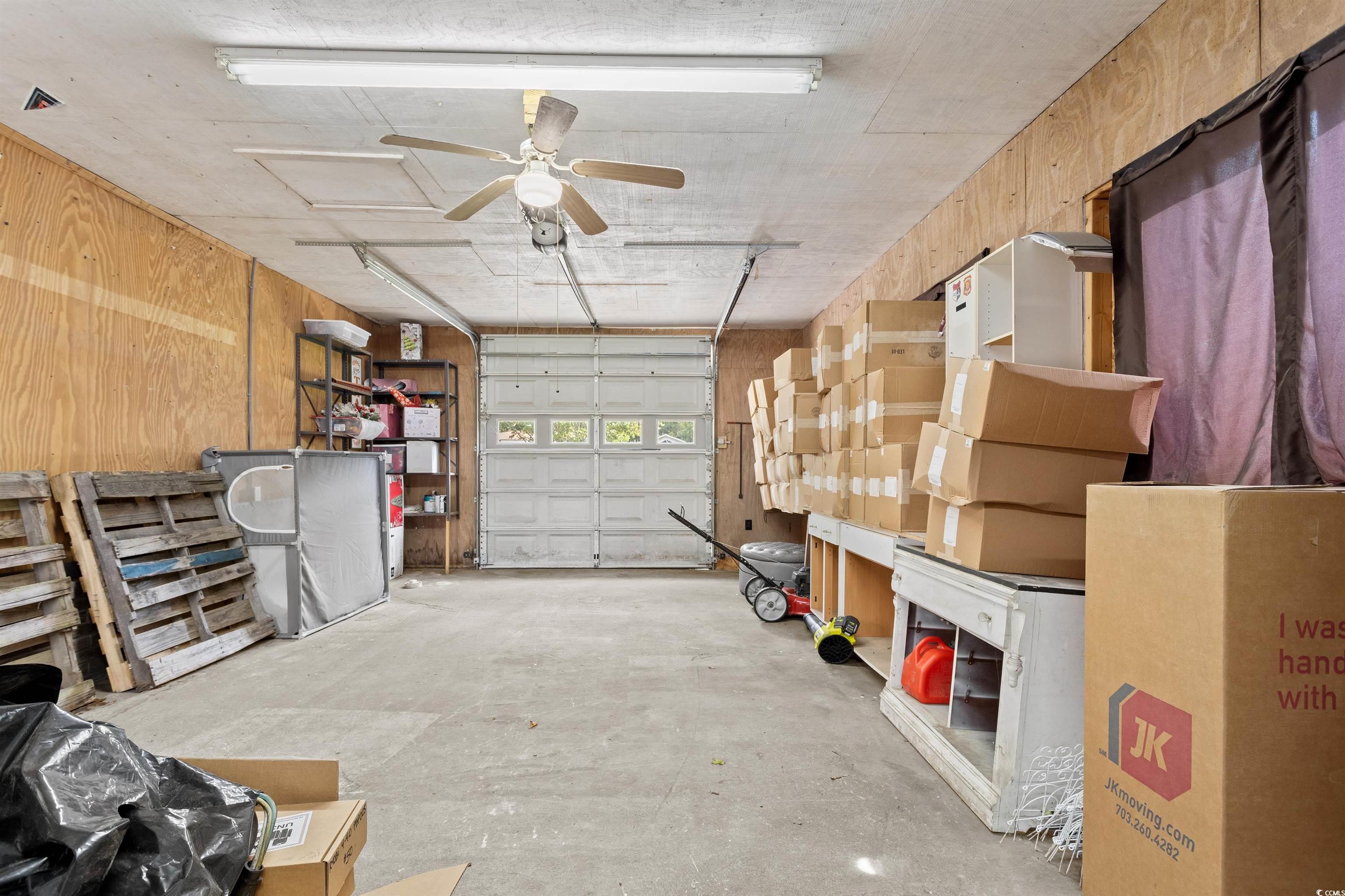 949 Derrick Lane Murrells Inlet, SC 29576 - Photo 34 of 40 Garage with ceiling fan