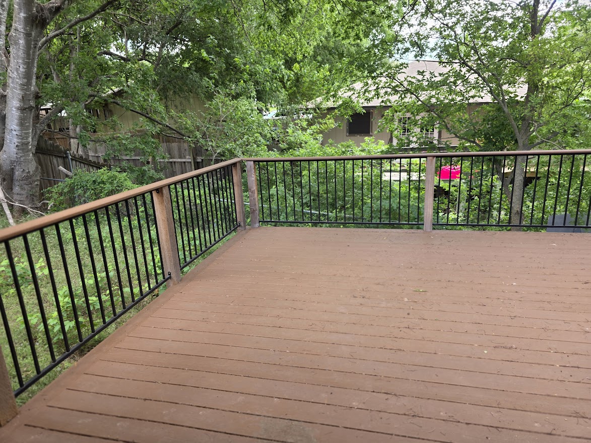 4803 Peach Grove Road Austin, TX 78744 - Photo 6 of 22 a view of a pathway bridge and tall trees