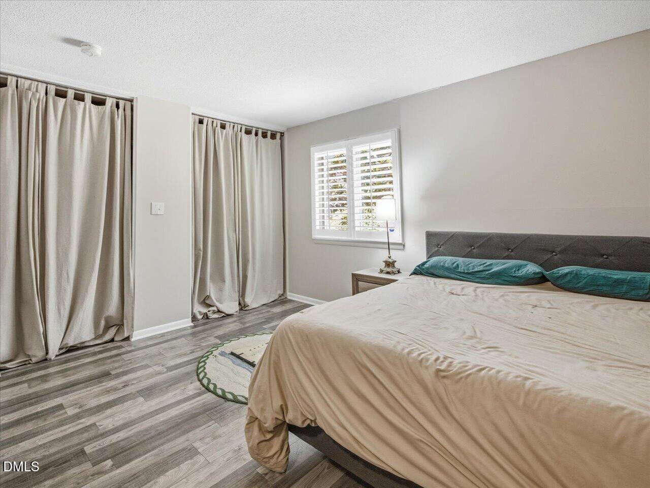4507 Edwards Mill Road, Unit A Raleigh, NC 27612 - Photo 19 of 35 33-Primary Bedroom