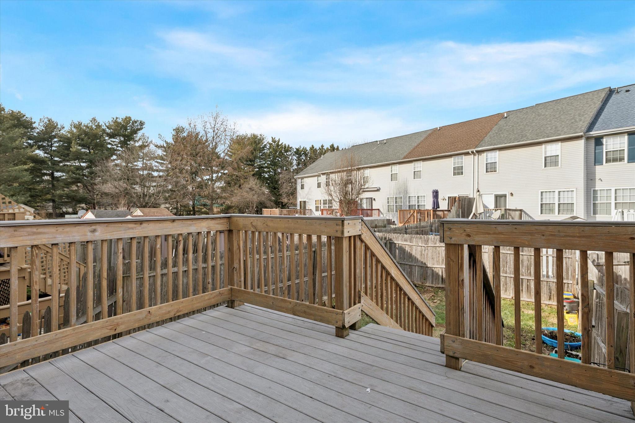 110 Hawk Drive Newark, DE 19702 - Photo 23 of 25 a view of balcony with wooden floor and fence