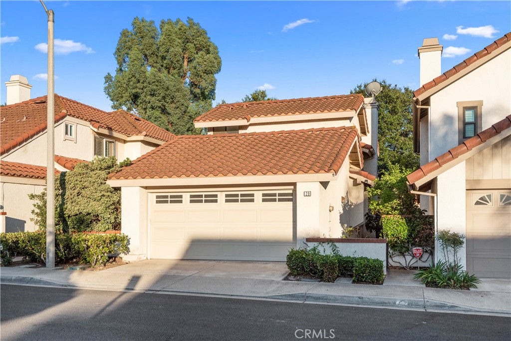 a view of a street with a building in the background