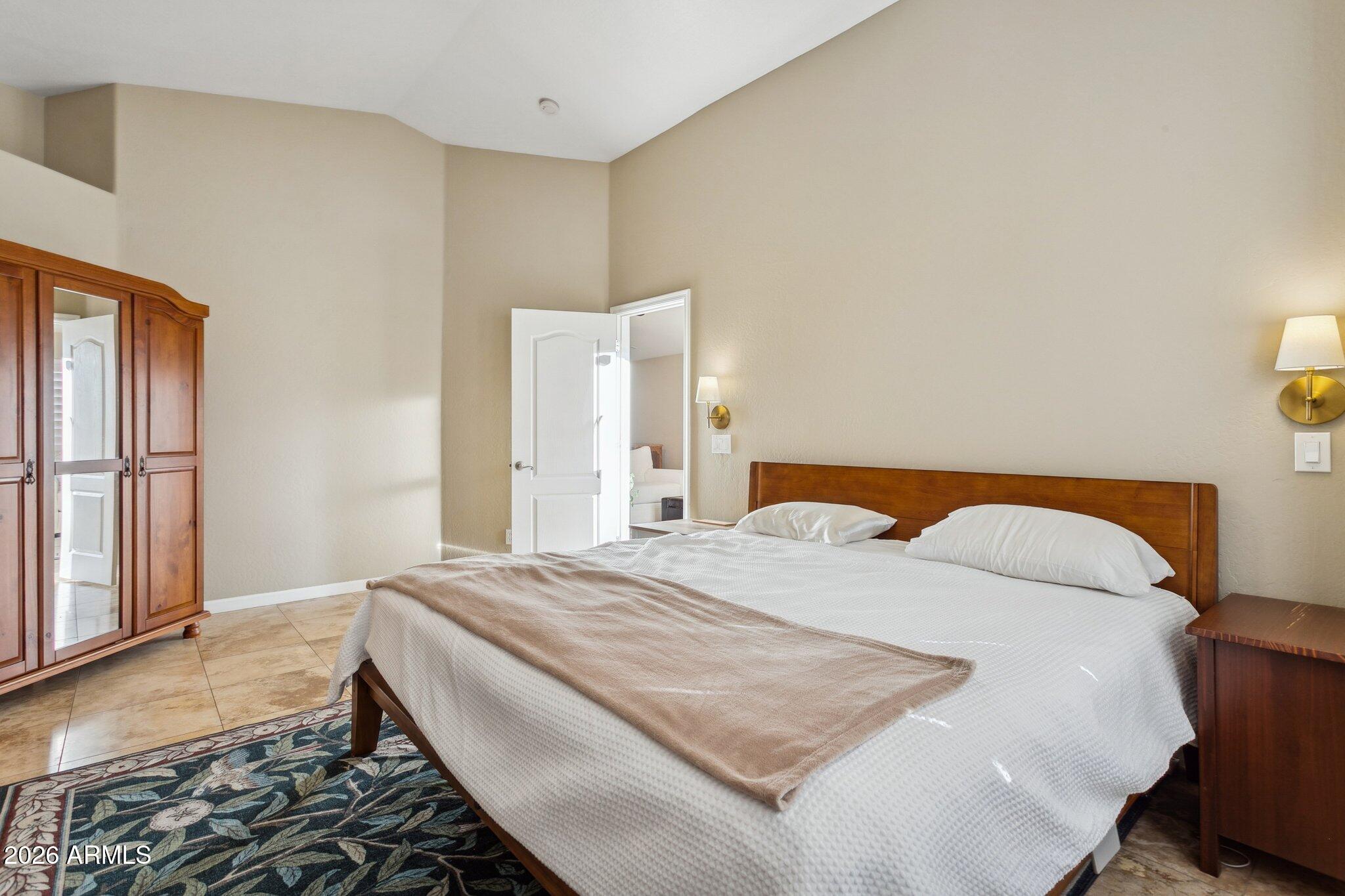 20238 North 9th Street Phoenix, AZ 85024 - Photo 16 of 38 a bedroom with a bed and a window