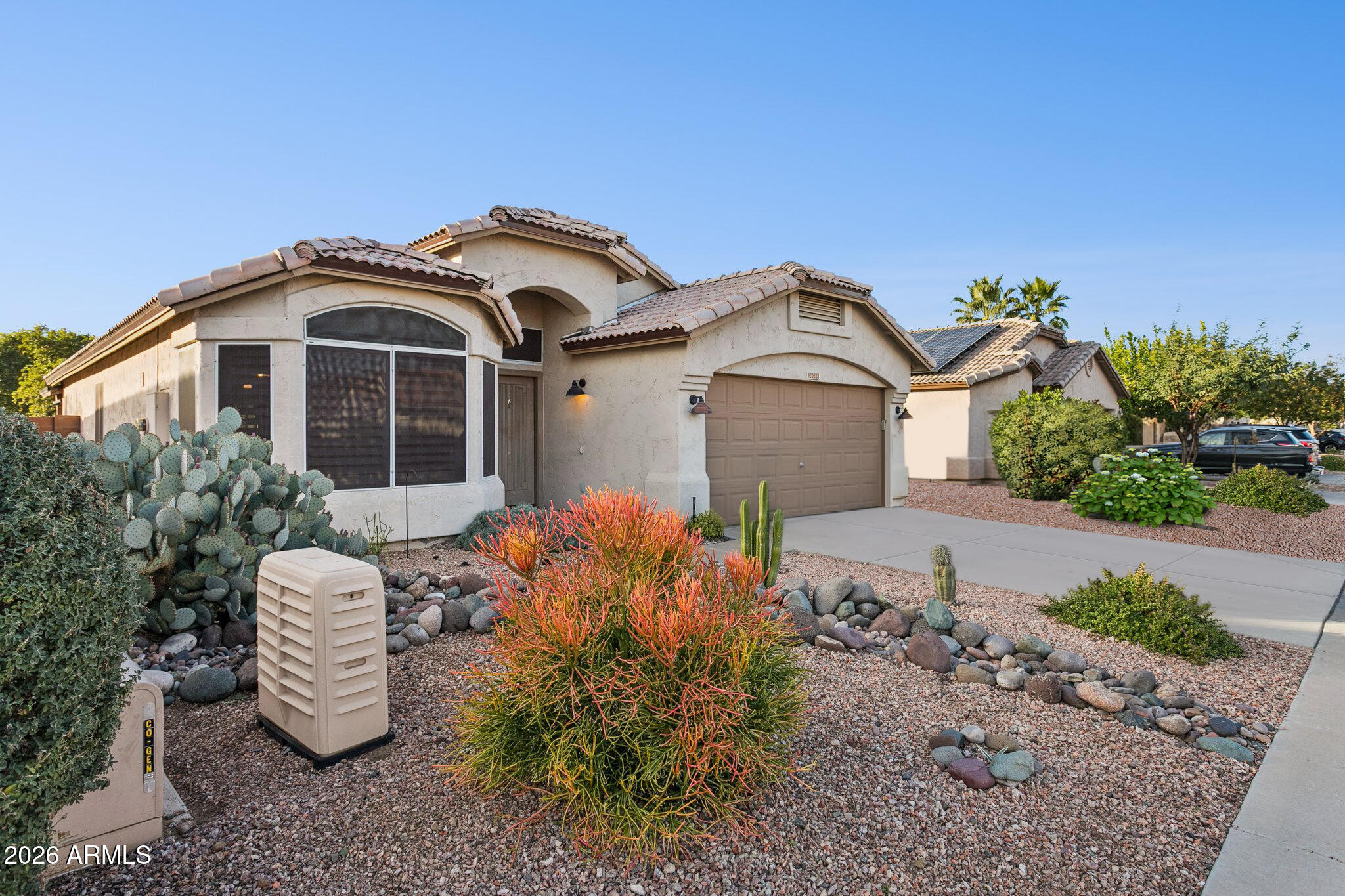 20238 North 9th Street Phoenix, AZ 85024 - Photo 32 of 38 a front view of a house with a garden