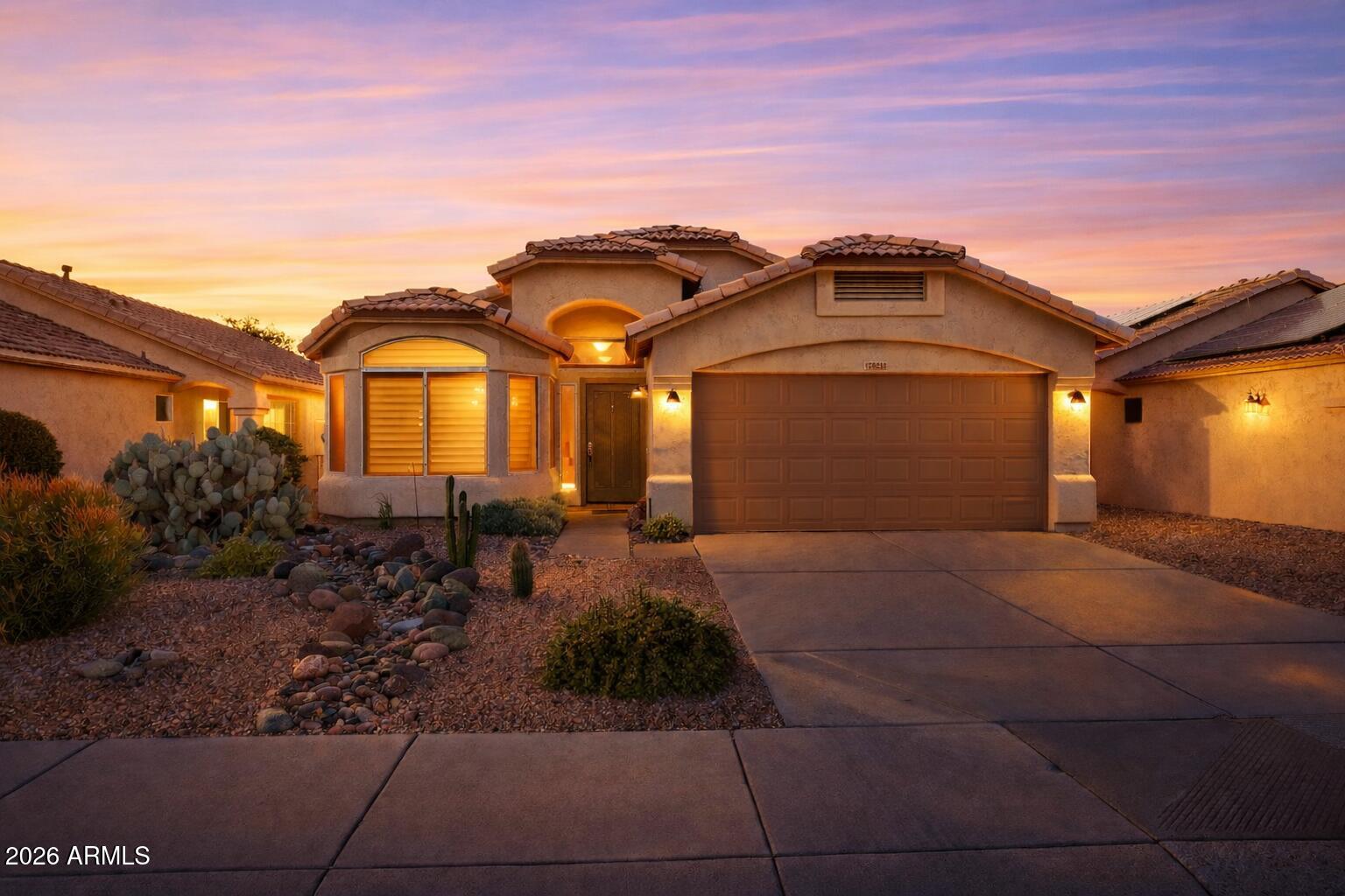 20238 North 9th Street Phoenix, AZ 85024 - Photo 35 of 38 a front view of a house with garden