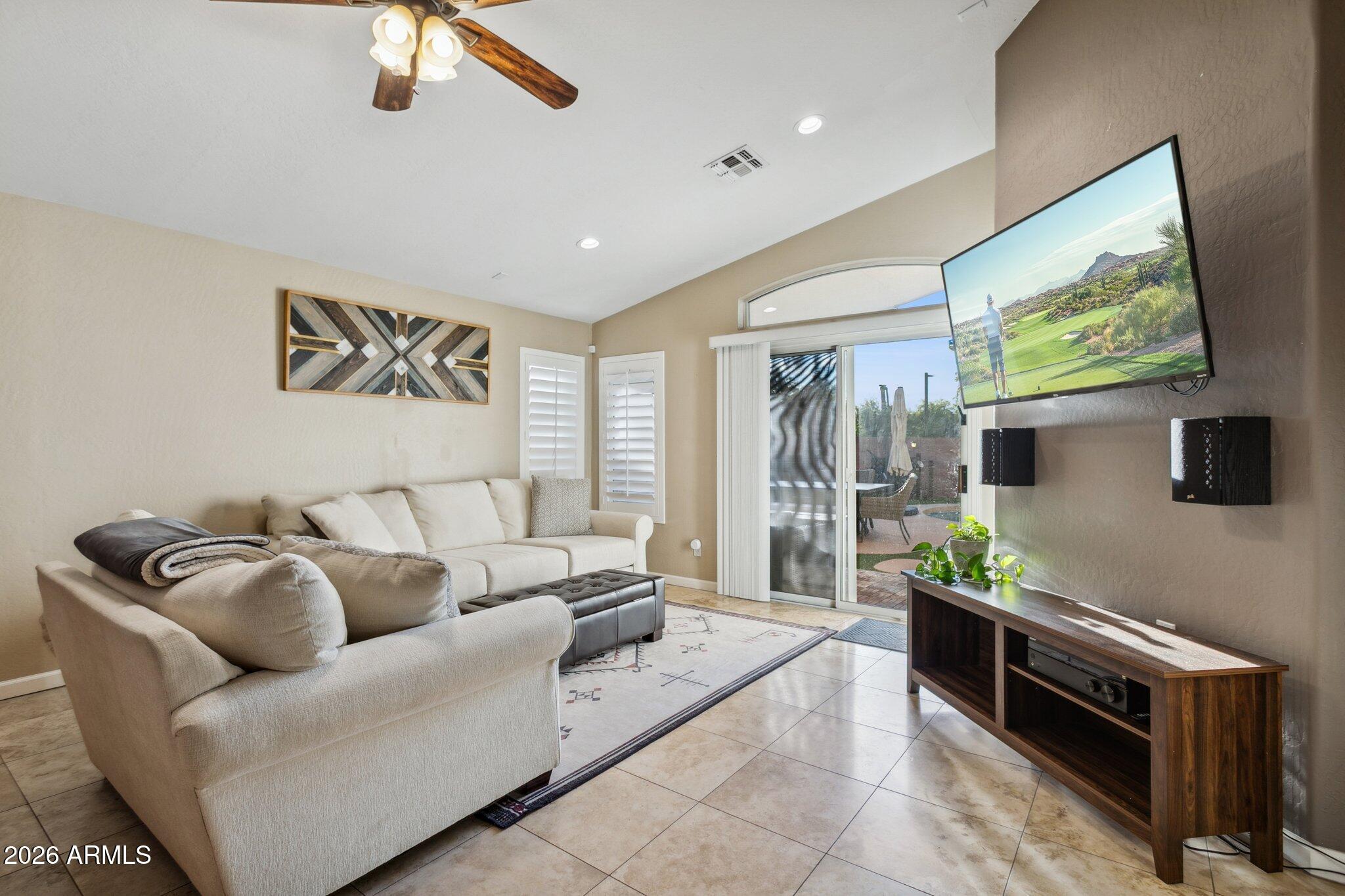 20238 North 9th Street Phoenix, AZ 85024 - Photo 7 of 38 a living room with furniture and a flat screen tv