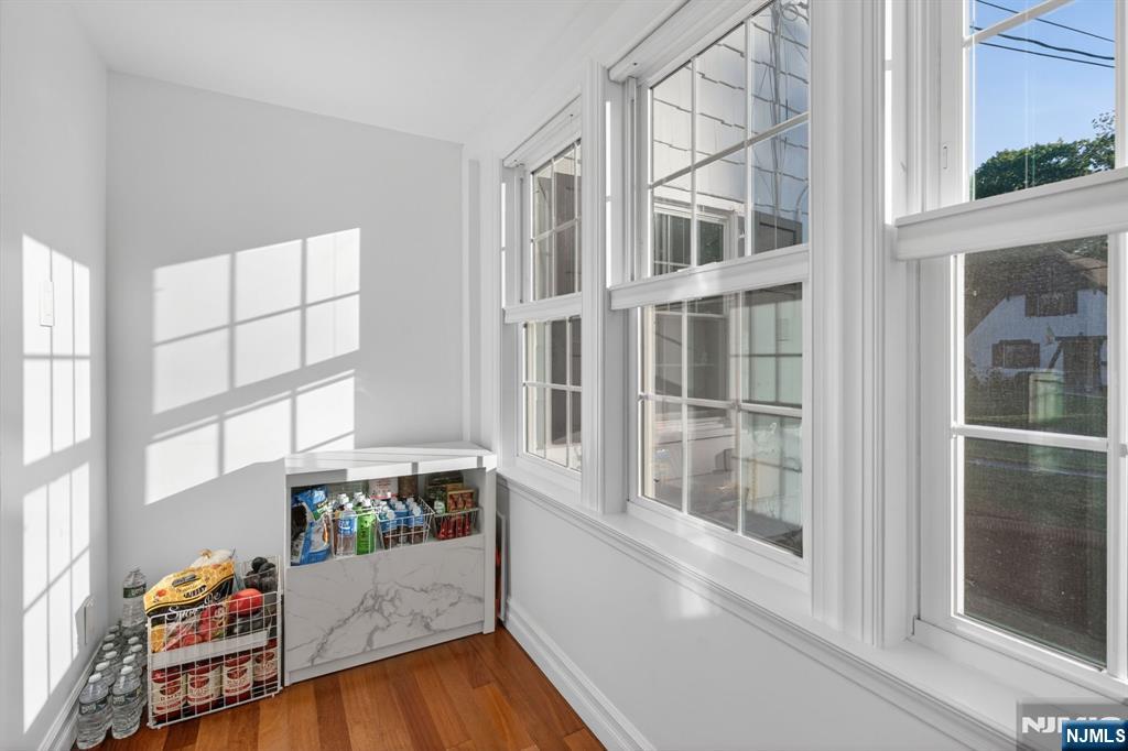 85 Whitney Road Short Hills, NJ 07078 - Photo 13 of 34 a view of an entryway with wooden floor and windows