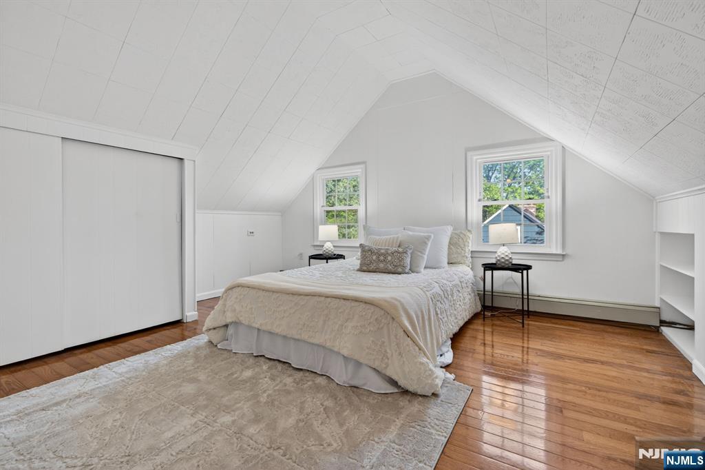 85 Whitney Road Short Hills, NJ 07078 - Photo 26 of 34 a bedroom with a bed and a window